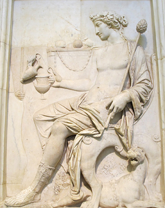 Ο Διόνυσος ένθρονος δεχόμενος σπονδή, μέ πάνθηρα στα πόδια του, ρωμαϊκό ανάγλυφο, ελληνιστικό
